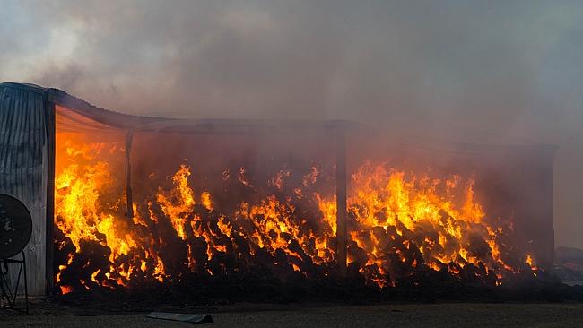 Two people have been confirmed killed with fears held for a third in a bushfire burning