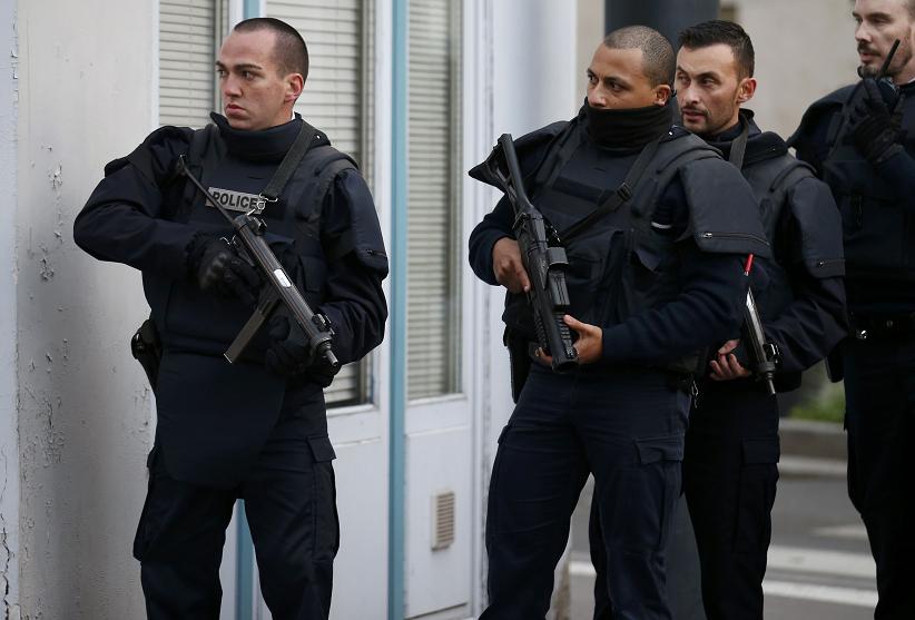 French police secure the area as shots are exchanged in Saint-Denis France near Paris during an operation to catch fugitives from Friday night's deadly attacks in the French capital. – Reuters pic