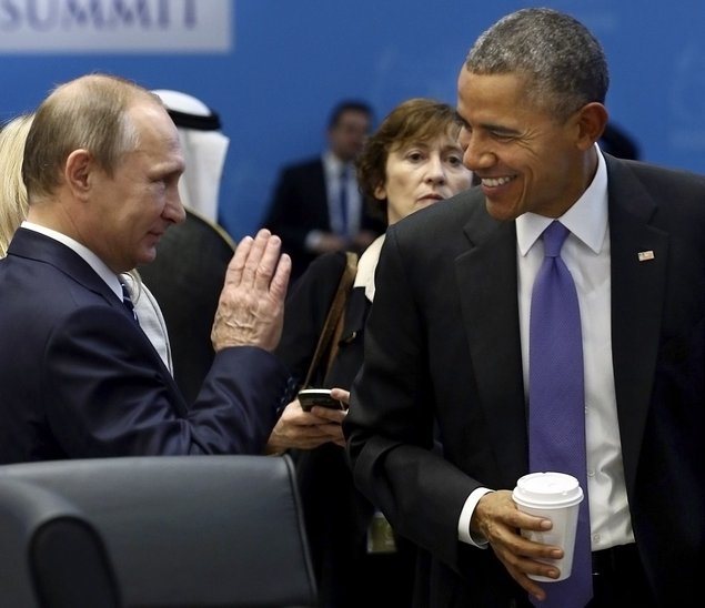 U.S. President Barack Obama talks with Russian President Vladimir Putin on Monday prior to a session of the G-20 Summit in Antalya Turkey