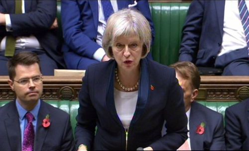 In this video grab Home Secretary Theresa May speaks in the House of Commons in London Wednesday Nov. 4 2015. British police and spies will get new powers to comb through citizens&#x27 online activity under a new law regulating cyber-snooping. The I