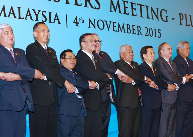 Brunei's Defense Minister Mohammad Yasmin Umar right talks with Indonesia's Defense Minister Ryamizard Ryacudu after the Association of Southeast Asian Nations Defense Ministers Meeting Plus in Kuala Lumpur Malaysia Wednesday Nov. 4 2015