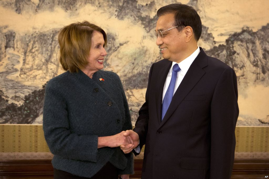 U.S. House of Representatives Minority Leader Nancy Pelosi left greets Chinese Premier Li Keqiang as she arrives for a bilateral meeting at the Zhongnanhai leadership compound in Beijing Nov. 13 2015