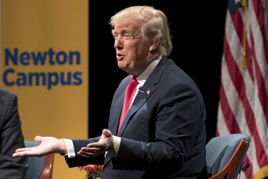 US Republican presidential candidate Donald Trump speaks at a campaign town hall forum in Newton Iowa