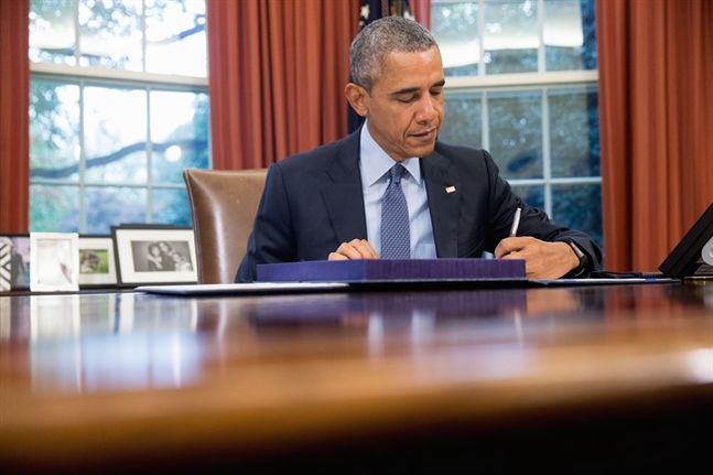 President Barack Obama signs H.R. 1314 the