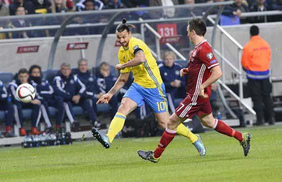 Sweden’s forward and team captain Zlatan Ibrahimovic shoots during one minute of silence for the victims of Paris attacks ahead of the Euro 2016 play-off football match between Sweden and Denmark at the Friends arena in Solna on Sunday. AFP