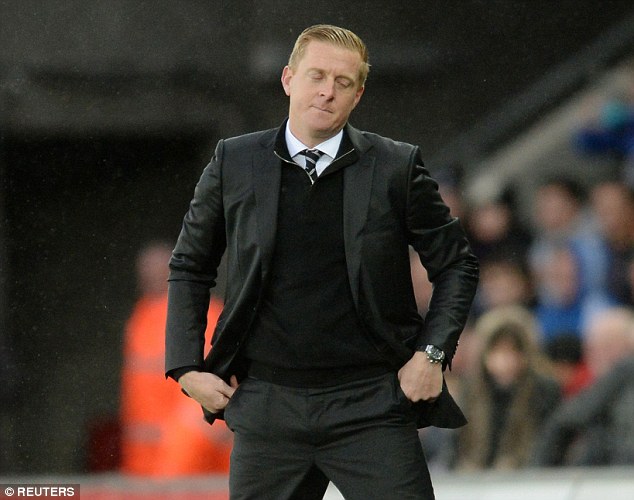 Under-fire Swansea manager Garry Monk has described club chairman Huw Jenkins as'extraordinary