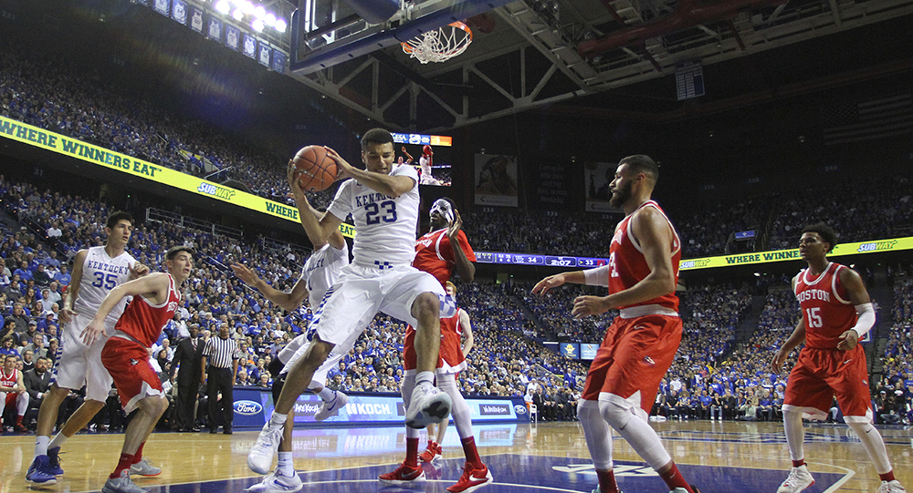 UK guard Jamal Murray pulls down an offensive rebound during the first half of the UK Men's Basketball game vs. Boston University at Rupp Arena. Tuesday