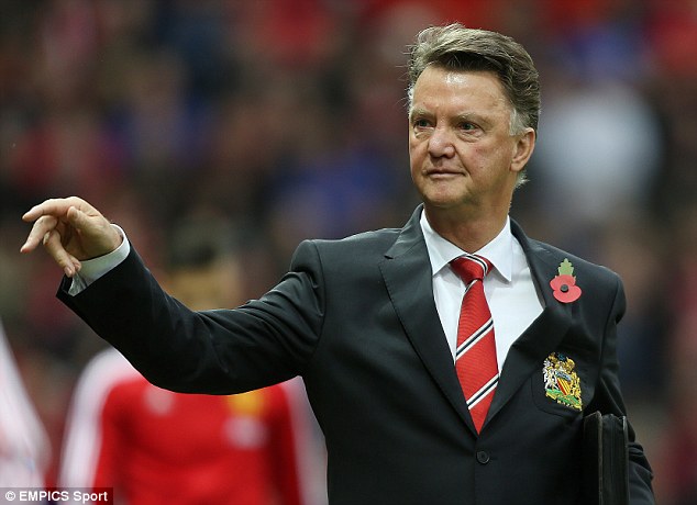 Van Gaal acknowledges the United faithful within Old Trafford prior to Saturday's kick-off against West Brom