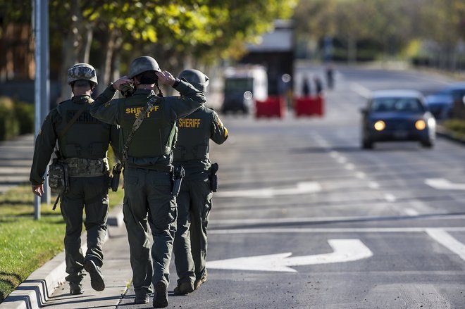 Merced County Sheriff SWAT members enter the University of California Merced campus after a reported stabbing in Merced Calif. Wednesday Nov. 4 2015. An assailant stabbed five people on the rural university campus in central California before police