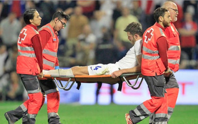 Michael Carrick suffers suspected ankle ligament damage comforted by Man United teammate