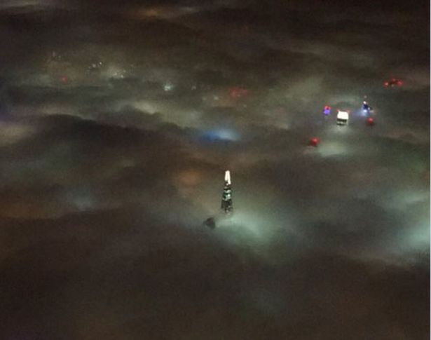 View of a foggy capital by Sarah Wells