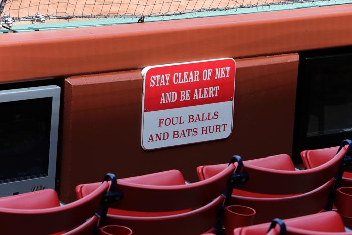 Boston MA- 06/06/15- View of netting protection and signs behind home plate.-, Section Metro Reporter Michael Vega  Laura Krantz Topic 07fenway LOID