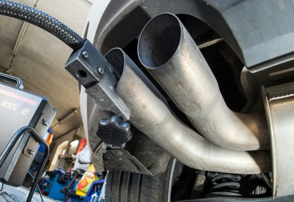 DPA  AFP  File  Patrick PleulA measuring hose for emissions inspections in diesel engines sticks in the exhaust tube of a Volkswagen Golf 2,0 TDI diesel car at a garage in Frankfurt an der Oder eastern Germany