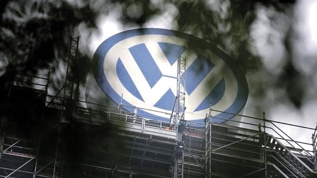 A Volkswagen logo stands on the roof of the company’s headquarters in Wolfsburg Germany