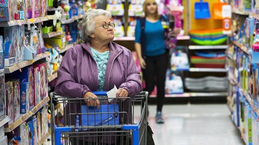 Shoppers look at merchandise at a Walmart store in Secaucus New Jersey