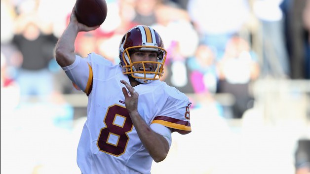 CHARLOTTE NC- NOVEMBER 22 Kirk Cousins #8 of the Washington Redskins throws a pass against the Carolina Panthers in the 3rd quarter during their game at Bank of America Stadium