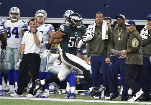 Philadelphia Eagles Jordan Hicks runs back an interception from the Dallas Cowboys for a touchdown in the second half of an NFL football game Sunday Nov. 8 2015 in Arlington Texas