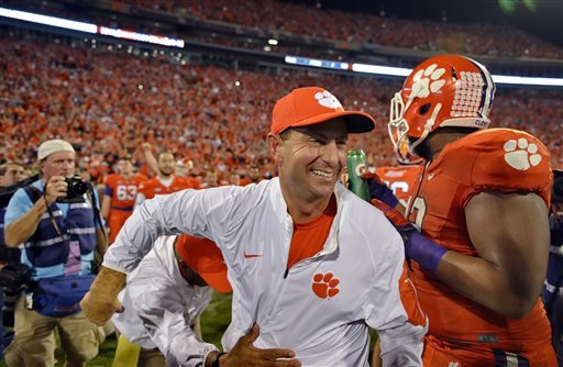 Clemson head coach Dabo Swinney celebrates after their 23-17 win over Florida State in an NCAA college football game Saturday Nov. 7 2015 in Clemson S.C