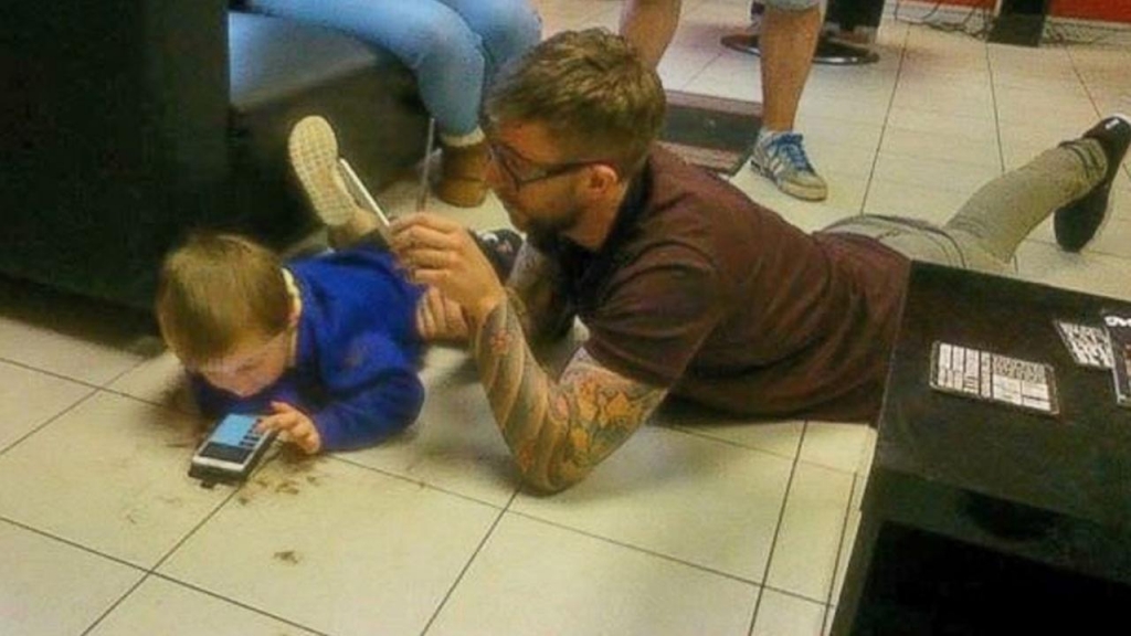 Welsh barber Jim Williams gives a 3-year-old boy with autism his first haircut