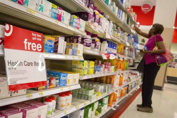 A customer shops in the pharmacy department of a Target store