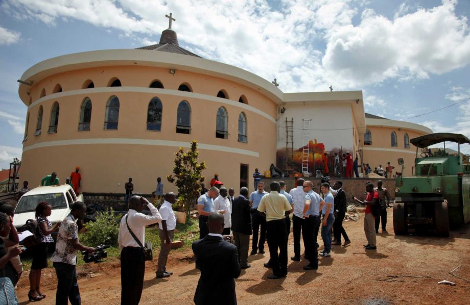 Security officials from Uganda and an advance team from the Vatican visit the Anglican Sanctuary of the Martyrs which Pope Francis is expected to visit later in the week at Namugongo a suburb in the east of Kampala in Uganda Monday Nov. 23 2015. Mor