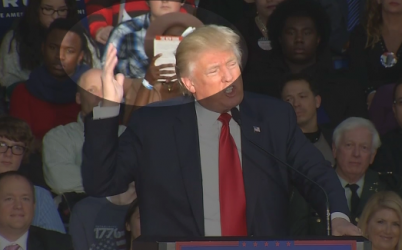 Johari Osayi Idusuyi reading book behind Donald Trump