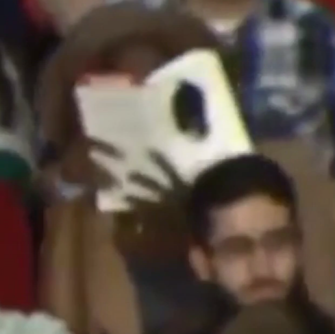 Woman reading during Donald Trump rally   		Vine Screenshot