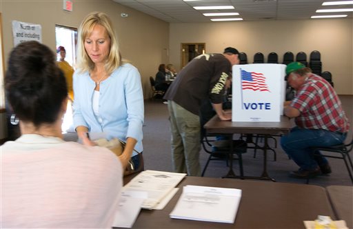 Cindy Gamrat the ousted state representative prepares to casts her ballot at the Gun Plain Township Mich. Hall on Tuesday Nov. 3 2015. Gamrat and Todd Courser who were booted from office over an extramarital affair and a convoluted cover-up scheme