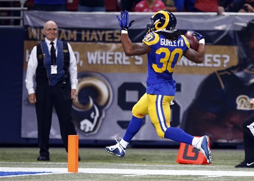 St. Louis Rams running back Todd Gurley scores on a 71-yard run during the second quarter of an NFL football game against the San Francisco 49ers Sunday Nov. 1 2015 in St. Louis