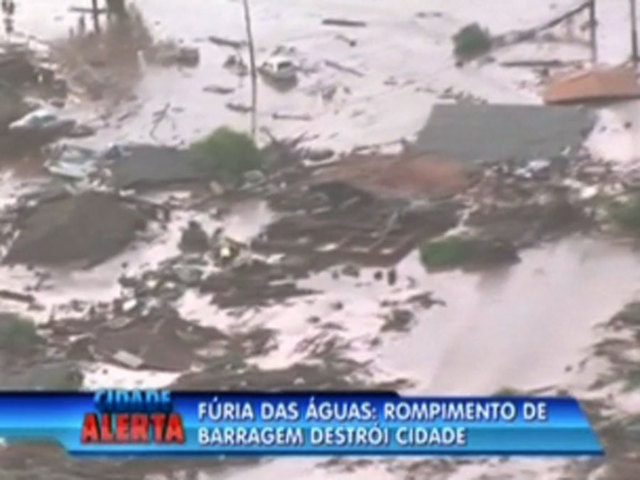 Dam bursts at mine in southeastern Brazil, submerging homes