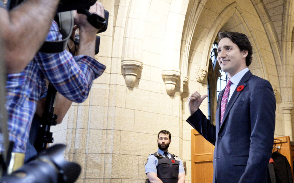 Canada's new left-wing PM Justin Trudeau sworn in after pledging to take 25000