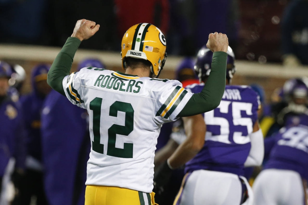 NFL: Rodgers, Packers beat Vikings