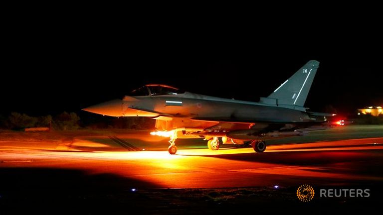 A British Royal Air Force Typhoon leaves for a mission from RAF Akrotiri in southern Cyprus