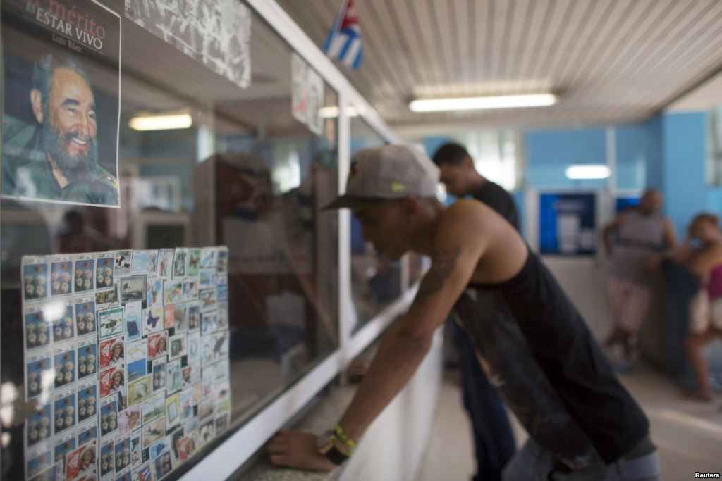 President Fidel Castro is seen inside a post office in Havana Dec. 11 2015