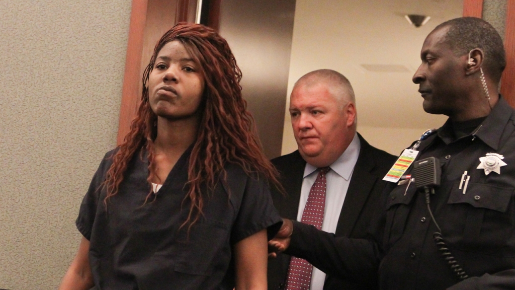 A woman accused of driving into a crowd in Las Vegas showed little emotion when facing court