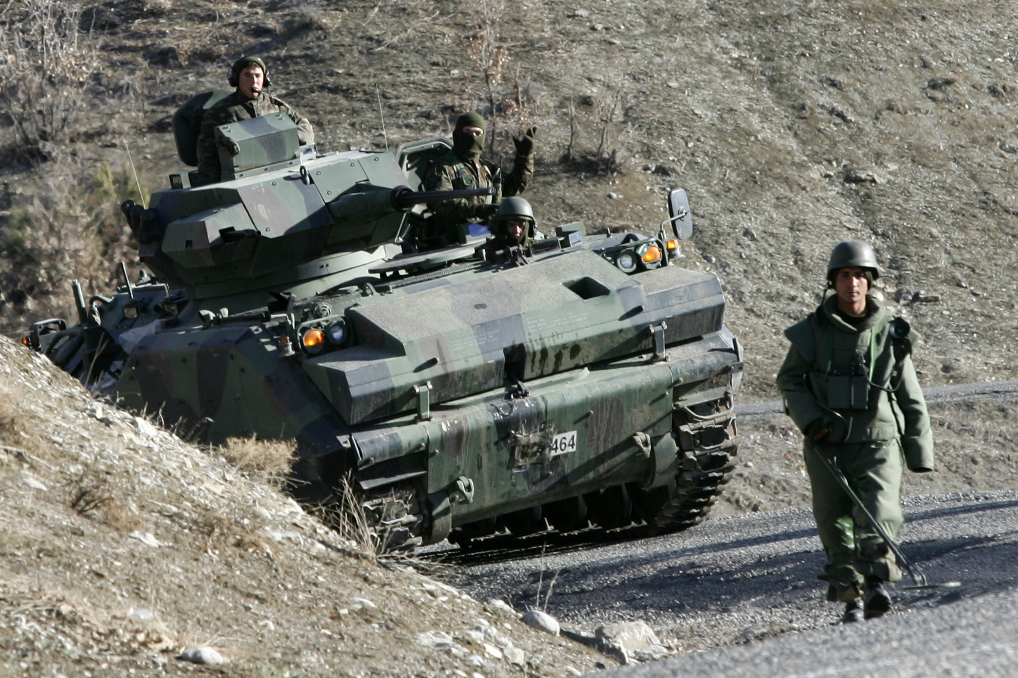 Turkish soldiers patrol on a road near the Turkey Iraq border in the mainly Kurdish southeastern province of Sirnak