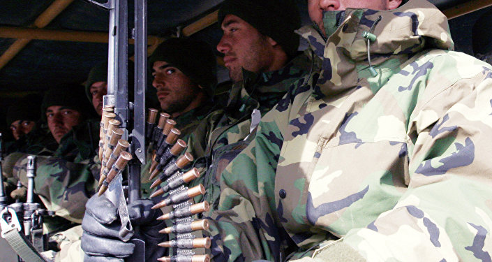 Turkish army troops sit in the back of a military truck as they return from northern Iraq in Cukurca in Hakkari province at the Turkey Iraq border Friday Feb. 29 2008