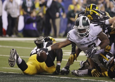 Big Ten Championship Game 2015: Michigan State stuns Iowa, secures playoff berth