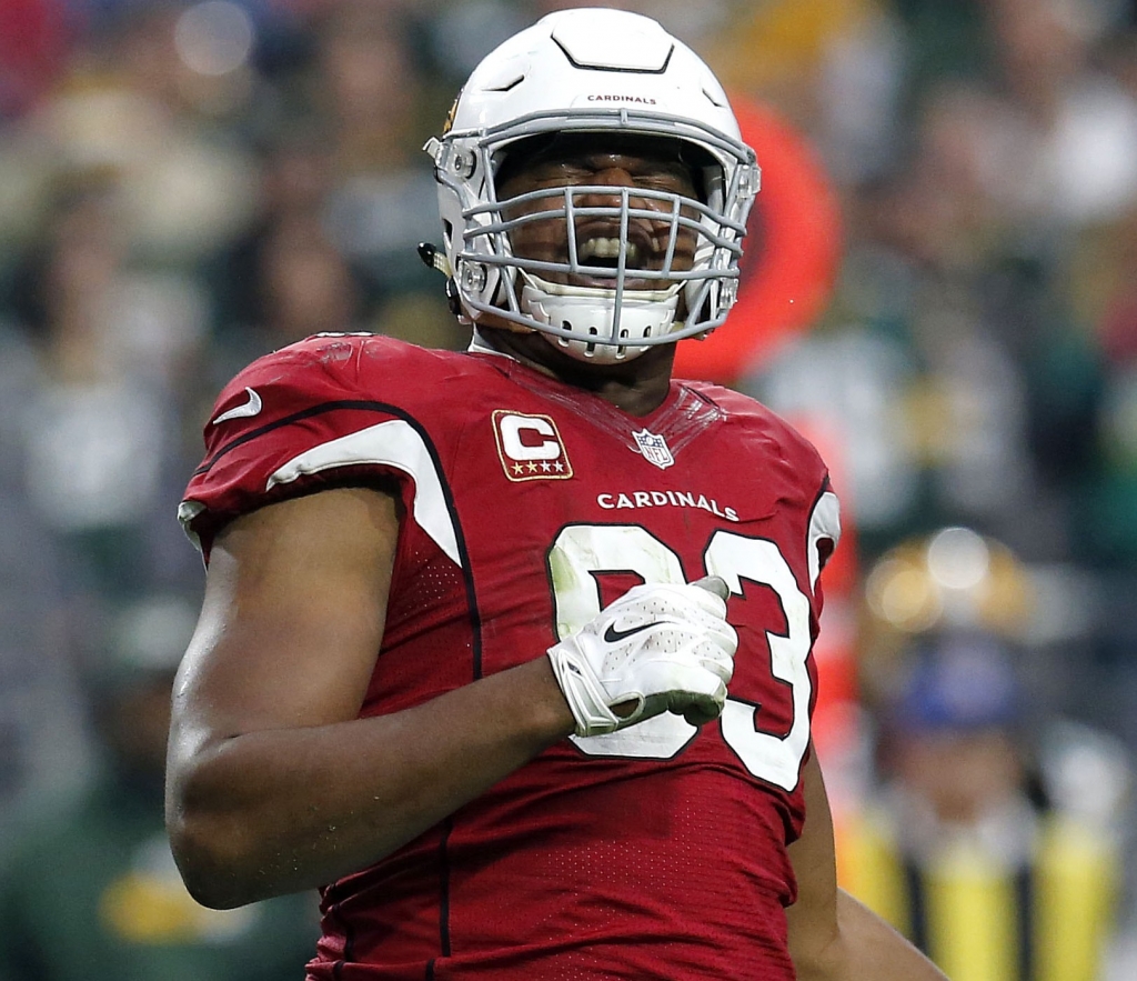 Arizona Cardinals defensive end Calais Campbell celebrates a defensive stop against the Green Bay Packers during the first half of an NFL football game Sunday Dec. 27 2015 in Glendale Ariz