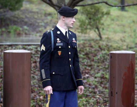 Bergdahl arraigned, defers plea on desertion charges