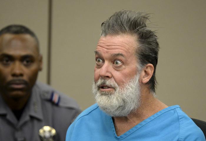 Robert Lewis Dear 57 accused of shooting three people to death and wounding nine others at a Planned Parenthood clinic in Colorado last month attends his hearing to face 179 counts of various criminal charges at an El Paso County court in Colorado Spri