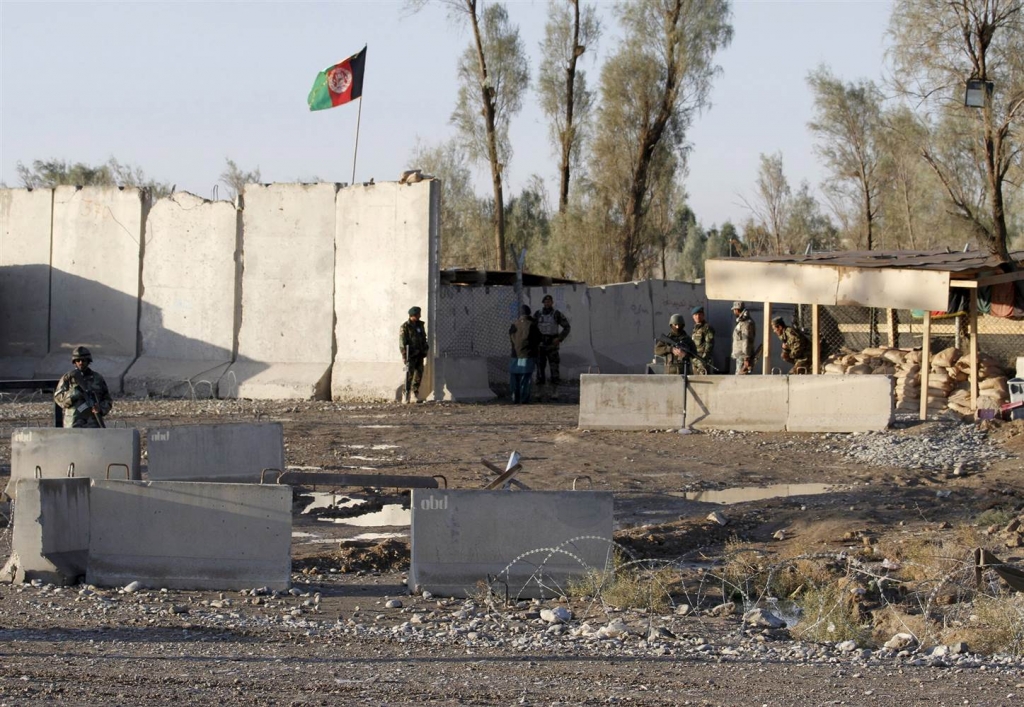 Afghan security forces at the entrance of Kandahar Airport on Wednesday. Reuters