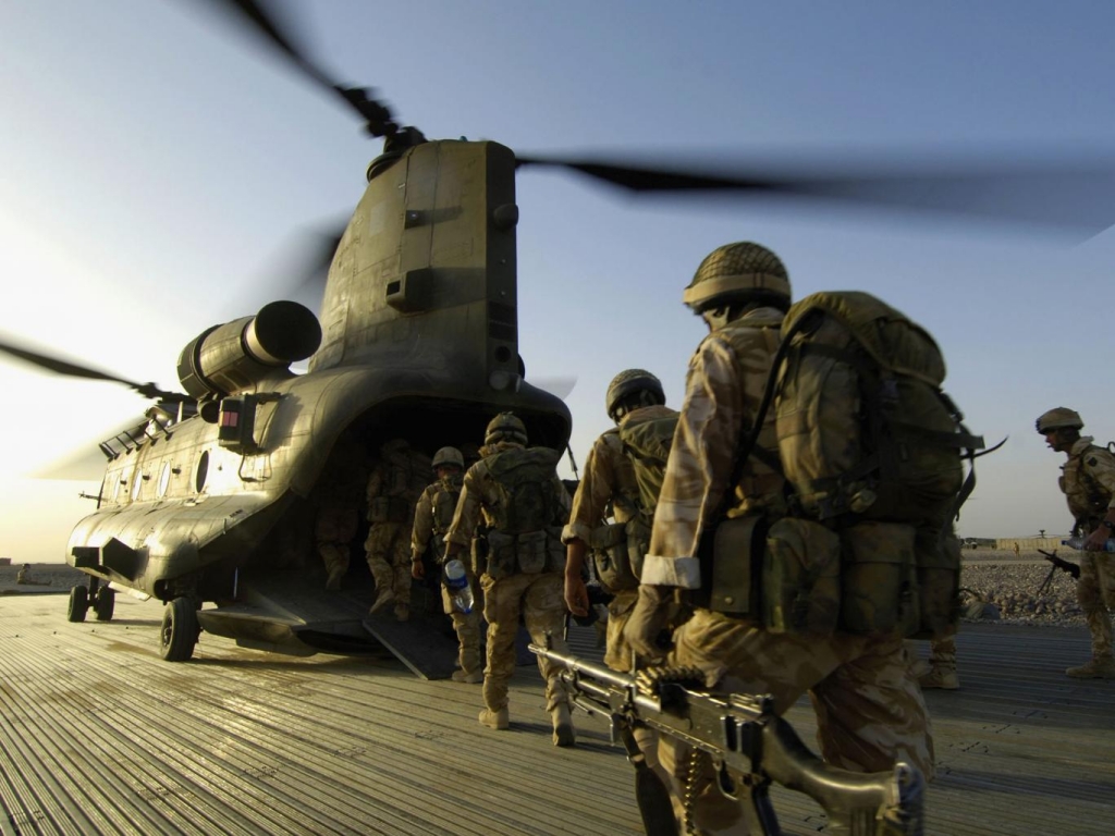 In this handout provided by the Ministry of Defence Para and soldiers of the Royal Irish Regiment prepare to board an RAF Chinook for Operation Atomi to Musa Qala