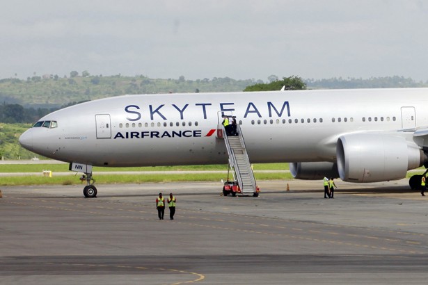 Airport workers are seen near the Air France Boeing 777 aircraft that made an emergency landing in Mombasa Kenya.         
                     John Amantea  Reuters