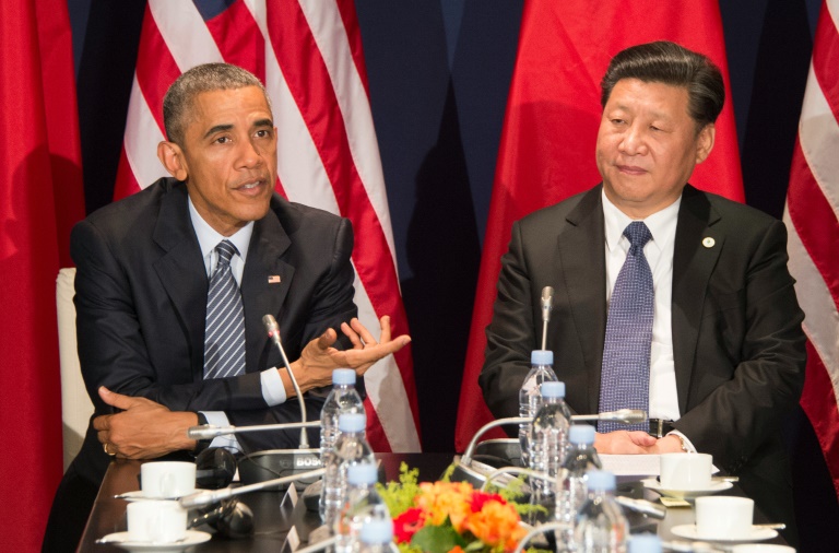 AFP  File  Jim Watson Barack Obama and Xi Jinping are committed to reaching an'ambitious climate deal in Paris the White House says