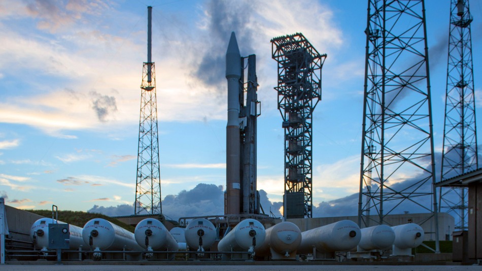 An Atlas V rocket carrying a Cygnus spacecraft on a launch pad in Florida