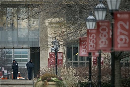 Campus security officers on the Main Quadrangles at the University of Chicago in Chicago on Monday Nov. 30 2015. The University of Chicago announced Sunday that all classes and other activities planned for Monday on its Hyde Park campus will be canceled