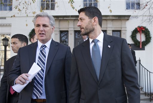 Speaker of the House Paul Ryan R-Wis. right and Majority Leader Kevin McCarthy R-Calif. leave a news conference following a GOP caucus meeting at the Republican National Headquarters on Capitol Hill in Washington Tuesday Dec. 8 2015. Ryan dismiss