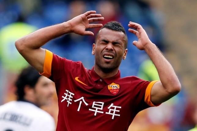 AS Roma's Ashley Cole reacts after missing a goal opportunity against Parma during their Italian Serie A soccer match at the Olympic stadium in Rome