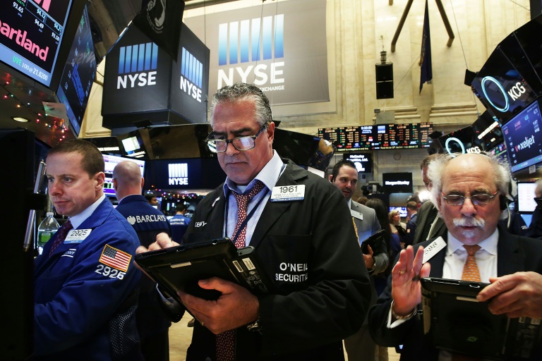 Getty  AFP  Spencer Platt Traders work on the floor of the New York Stock Exchange